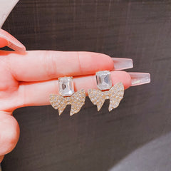 ZJE-165 Sparkling Bow Shape Zircon Earrings – Korean Style Gold Drop Earrings