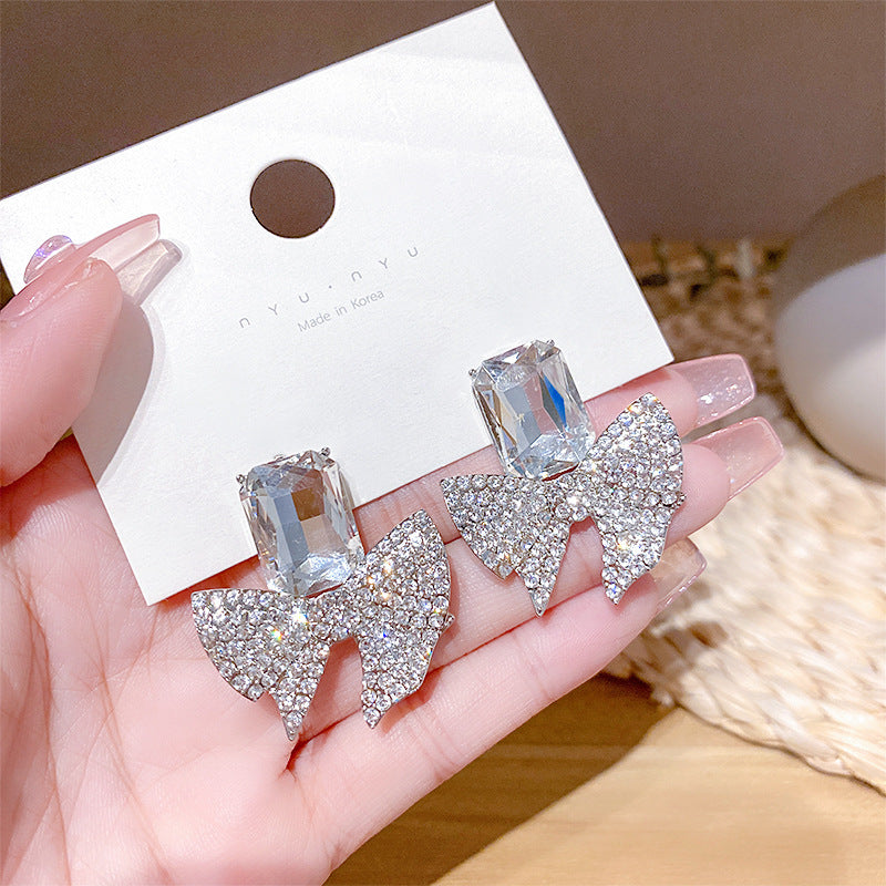 ZJE-165 Sparkling Bow Shape Zircon Earrings – Korean Style Gold Drop Earrings